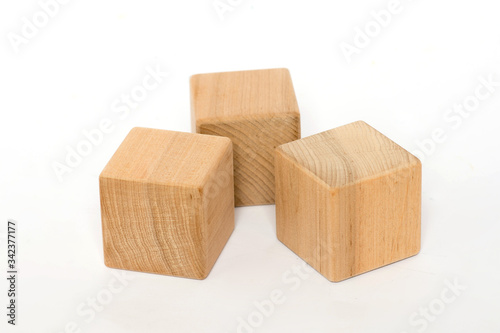  wooden cube on a white background, children's eco toys for toddlers, the development of fine motor skills and thinking in children