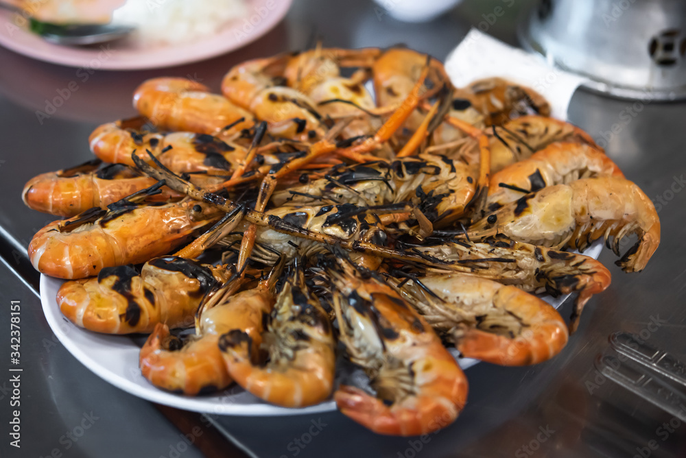 Grilled prawns on the plate.