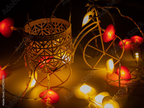 decorative tricycle with a basket on the background of blurred lights © Pavel Kovalevsky