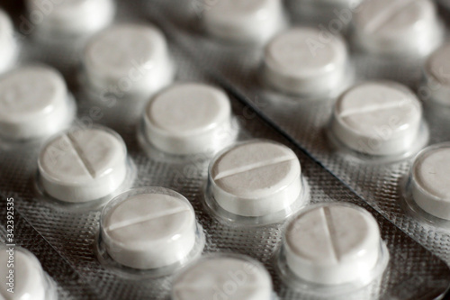White tablets in blisters, health care