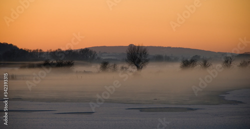 Landscape with fog at dawn