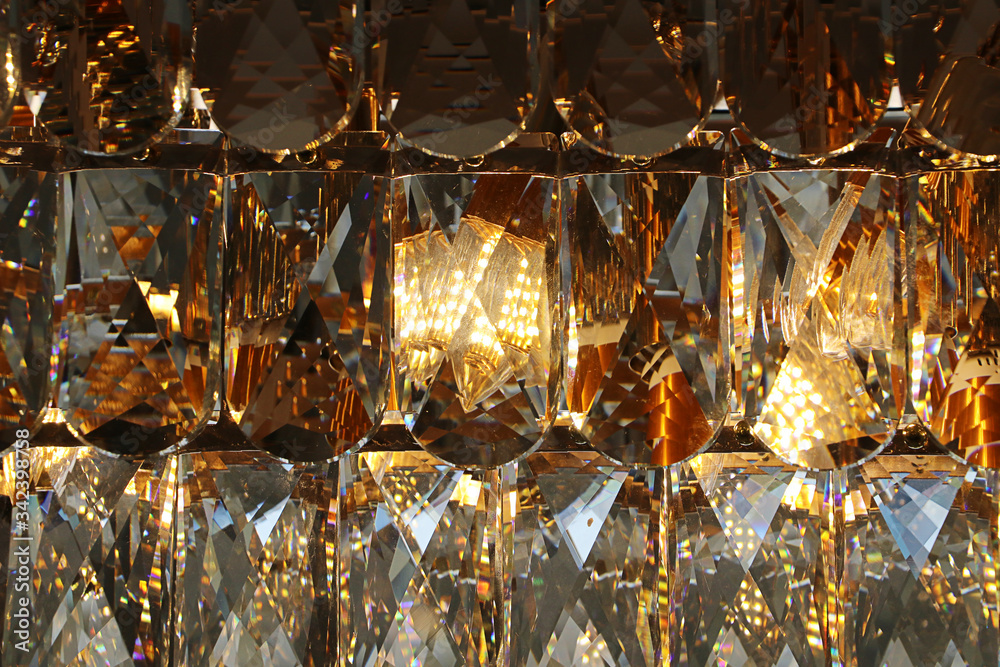 Close up detail of crystal pendant chandelier, Beautiful ceiling lighting for interior Close up detail of crystal pendant chandelier, Beautiful ceiling lighting for interior