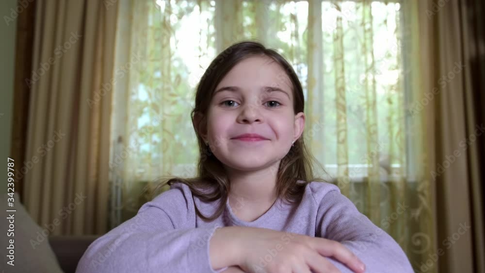 Little girl having a video call at home Little girl having a video call at home