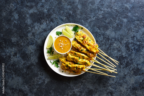 Chicken satay with peanut sauce photo