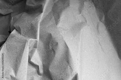 craft  crumpled paper background in black and white mode 