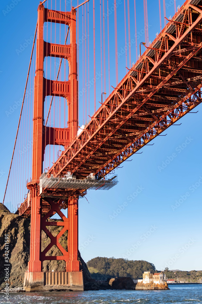 Obraz premium Famous Golden Gate Bridge in San Francisco California USA. The Golden Gate Bridge is a suspension bridge spanning the Golden Gate connecting San Francisco bay and pacific ocean