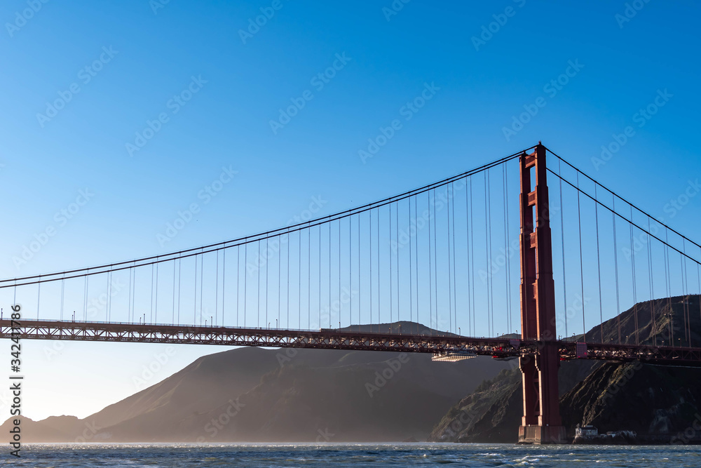 Fototapeta premium Famous Golden Gate Bridge in San Francisco California USA. The Golden Gate Bridge is a suspension bridge spanning the Golden Gate connecting San Francisco bay and pacific ocean