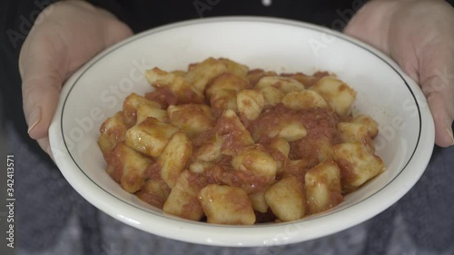 serve the potatoes gnochi with fresh tomato