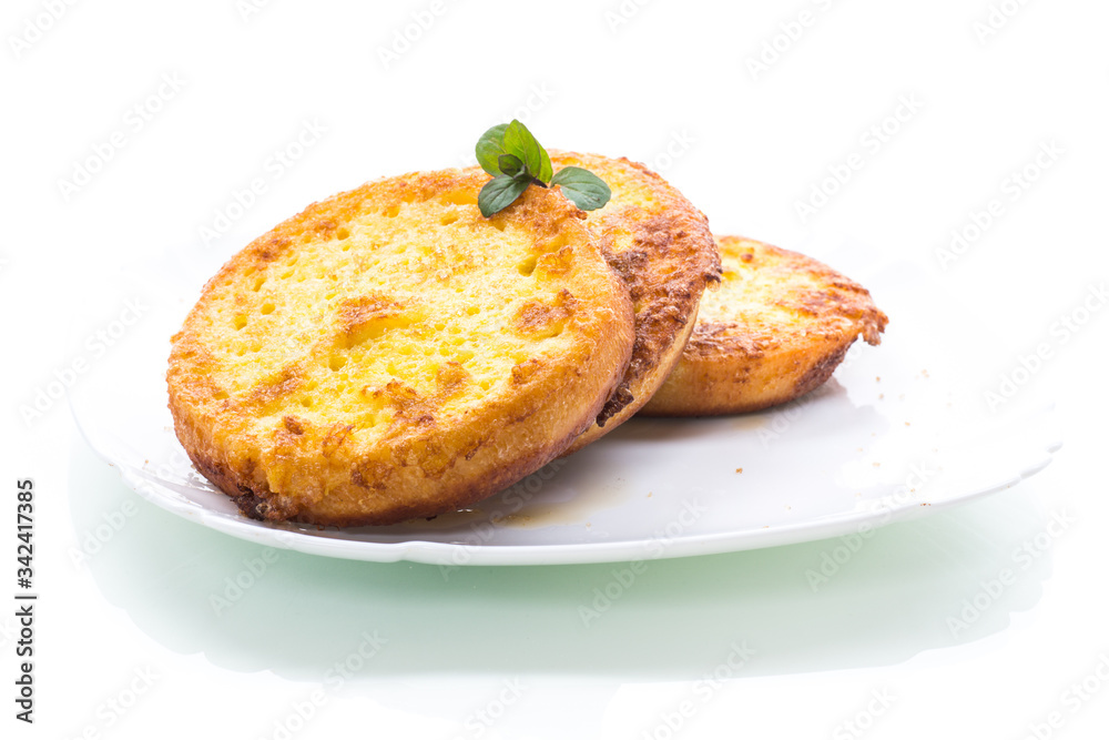 round bread croutons fried in batter in a plate round bread croutons fried in batter in a plate