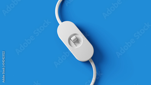 Closeup of white light switch on blue background.
