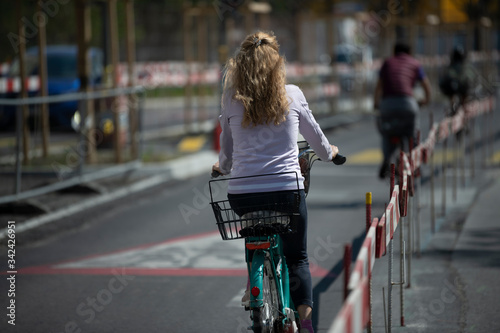 Cyclists ride on the road.