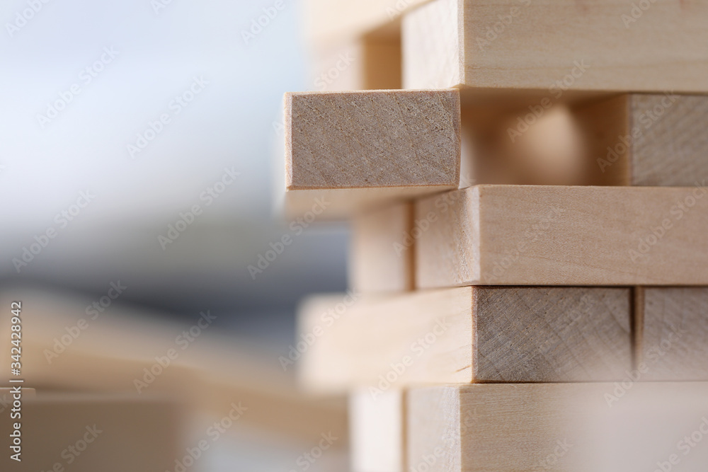 Close-up wooden blocks stacked in construction Close-up wooden blocks stacked in construction