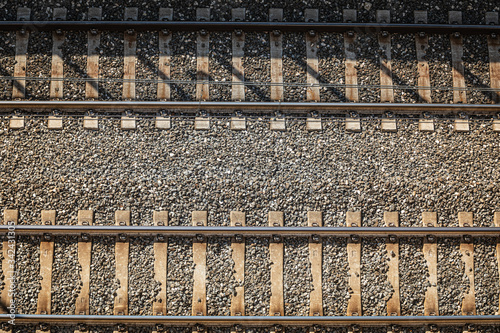 Railroad tracks. From above. A pair of train track lines path with a view from top. Travel concept route.