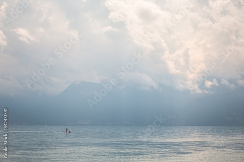 a walk on a sup board with a child, Lake Geneva, Switzerland