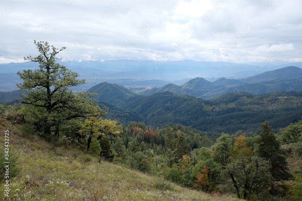 Beautiful mountain autumn views on the route from the Mt. Megruki peak to Atskuri. Borjomi-Kharagauli National Park, Borjomi, Georgia. Beautiful mountain autumn views on the route from the Mt. Megruki peak to Atskuri. Borjomi-Kharagauli National Park, Borjomi, Georgia.