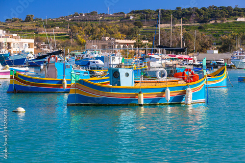 Traditional fishing boats in the Mediterranean Village of Marsaxlokk, Malta