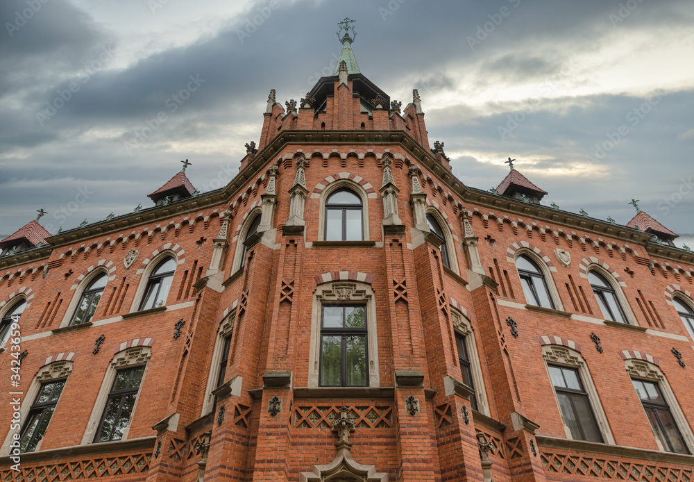 Fototapeta premium Front view brick building of Higher Seminary in Krakow, Poland