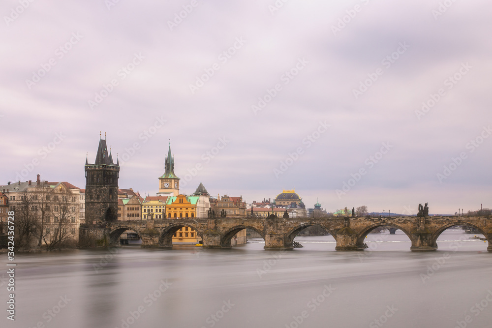 view of Charles bridge in Prague over the Vltava river