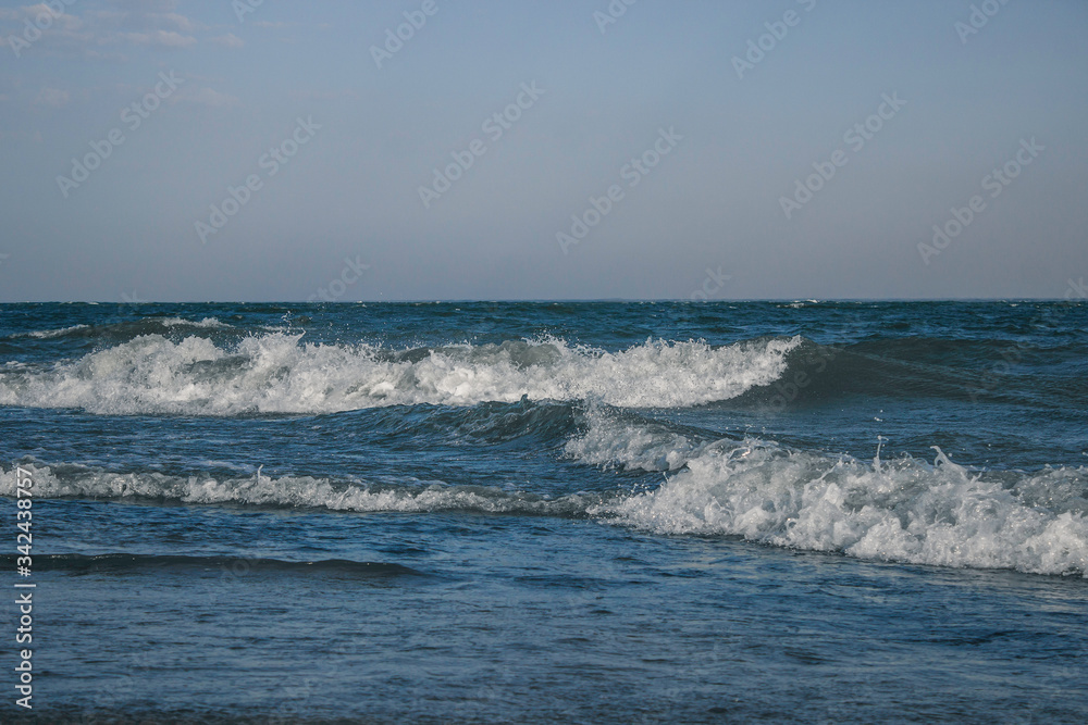 Sea waves with white foam