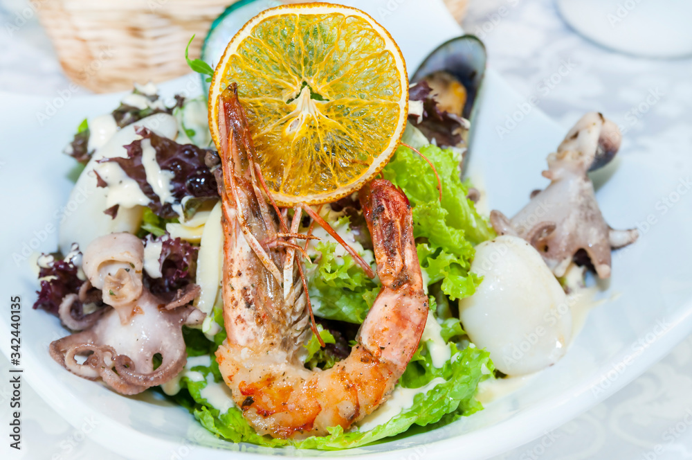 Octopus shrimp squid seafood salad closeup shot in restaurant.
 
