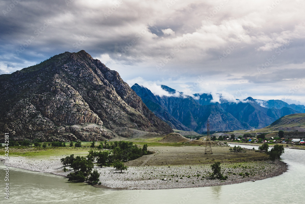 An impressive mountain range at the turn of the Chuya river in the Ongudaysky district of the Altai territory, Russia