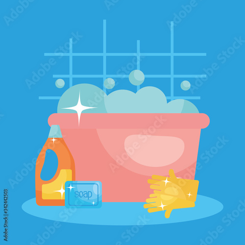 cleaning elements and bucket with soapy water, colorful design
