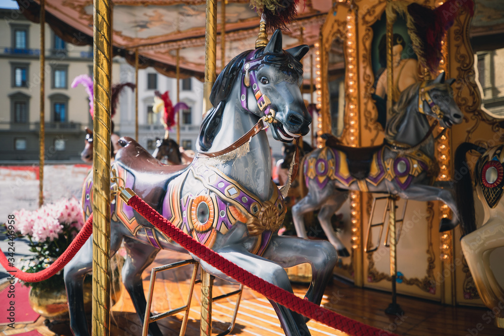 A carousel horse in a park in Florence, Italy