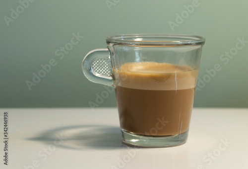 Cup of  expresso cortado coffee photo