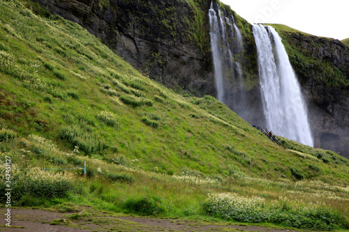 Seljalandsfoss / Iceland - August 15, 2017: Seljalandsfoss one of the most famous Icelandic waterfall, Iceland, Europe