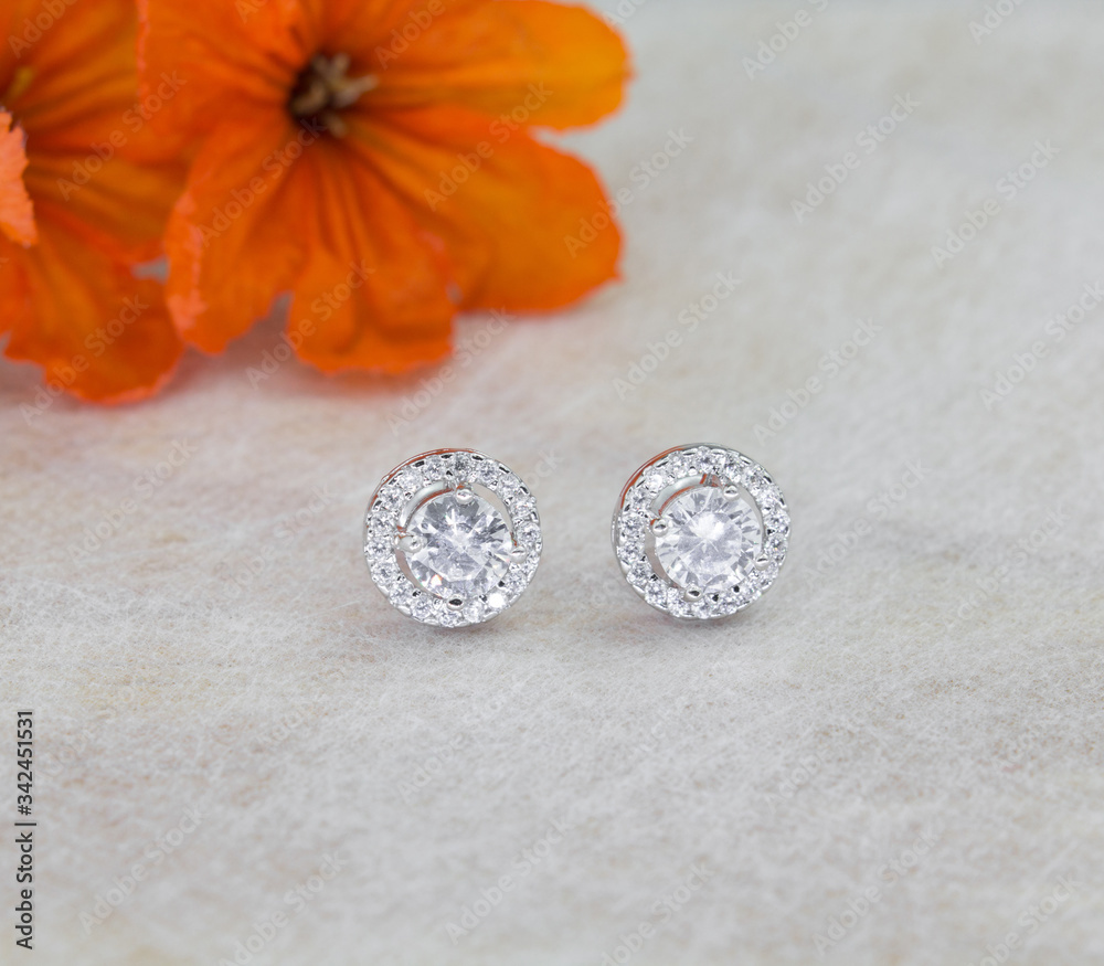 A pair of beautiful 925 sterling silver earrings with cubic zirconia isolated A pair of beautiful 925 sterling silver earrings with cubic zirconia isolated