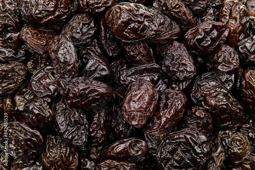 Background of dried plums and prunes, texture