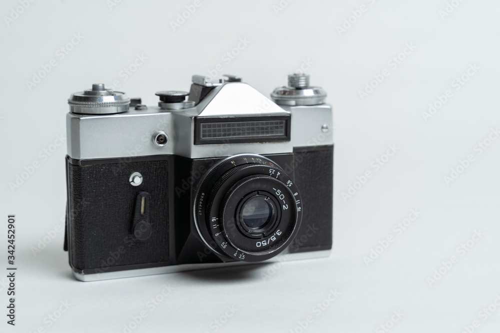 silver old vintage film camera zenith on a white background