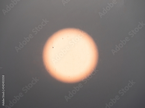 Blurred image of the sun at sunset.