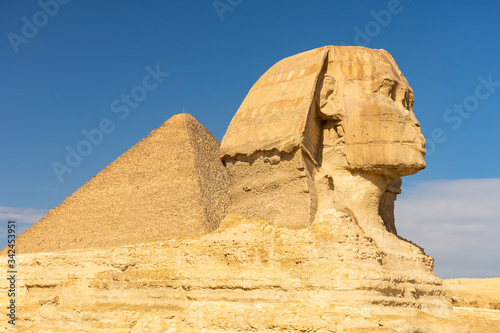 The Great Sphinx of Giza with the pyramids on background