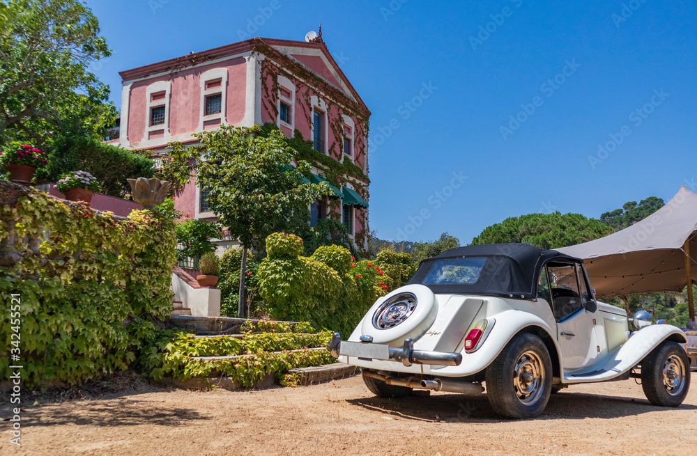 Classic white car, ready for a wedding