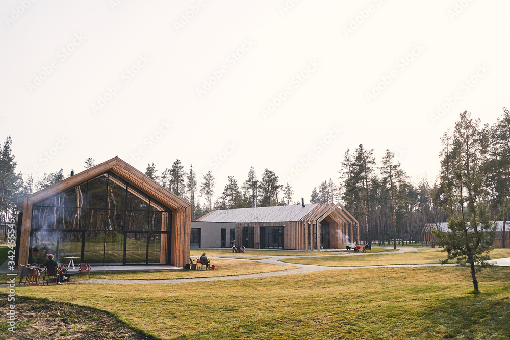 Obraz premium People spending their leisure time in a cottage estate