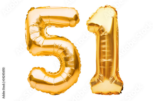 Number 51 fifty one made of golden inflatable balloons isolated on white. Helium balloons, gold foil numbers. Party decoration, anniversary sign for holidays, celebration, birthday, carnival photo