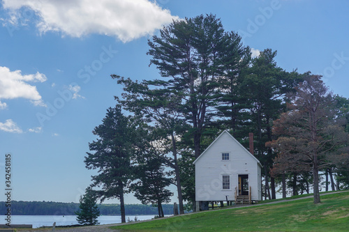 Bath, Maine, USA: A small outbuilding on the grounds of the Maine Maritime Museum, on the Kennebec River. photo