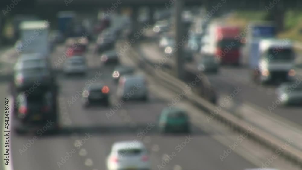 Defocused traffic on a motorway in England Manchester M6 Defocused traffic on a motorway in England Manchester M6