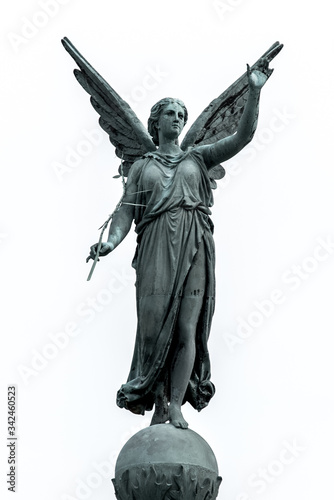 Abstract image of statue of ancient goddess Victoria (Nick) with palm branch in hand. The epitome of victory. photo