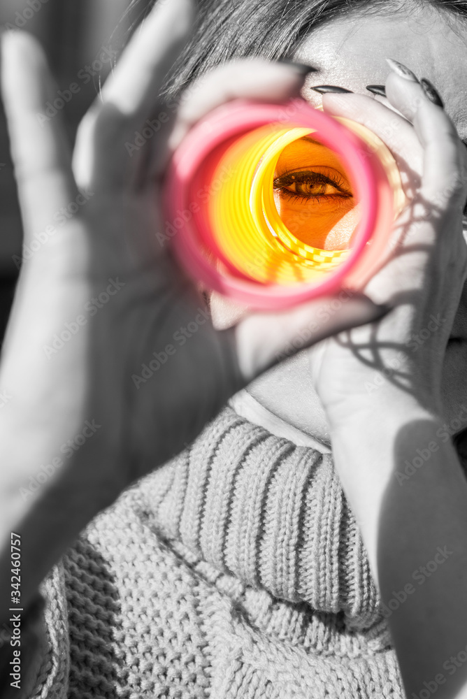 Abstract image of a girl on a black and white background with color of vision (vision restoration, optimism, ending depression - concept)