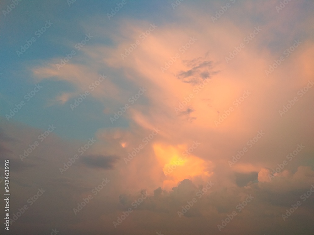 Amaizing summer sunset with rose clouds