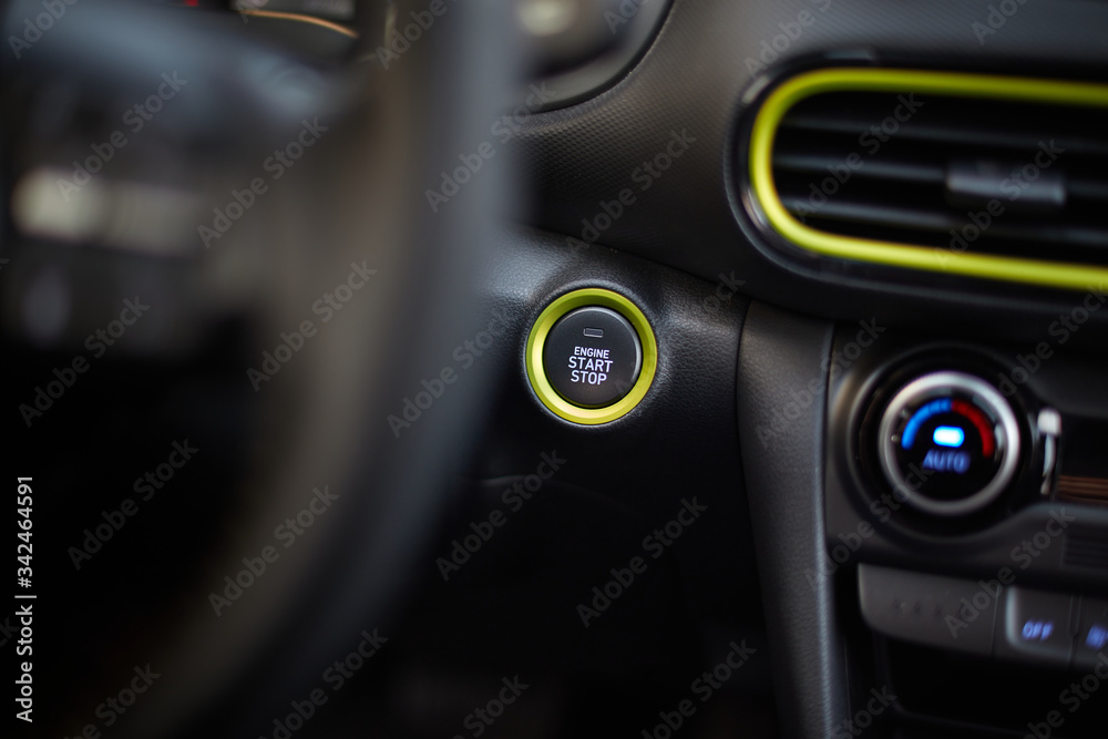 Start/stop button for starting the engine in a modern car