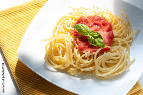 Принти на полотні dish with spaghetti and tomato sauce on the white table