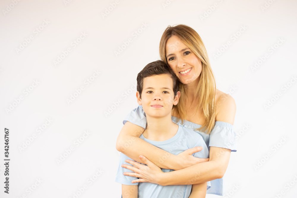 Beautiful woman hugging her son Beautiful woman hugging her son