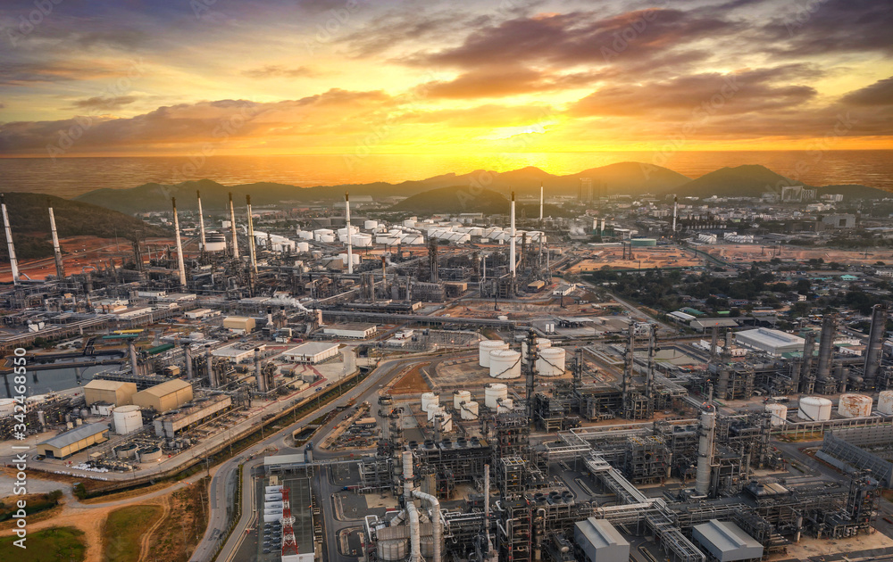 Aerial view Oil and gas refinery industrial zone on sunset time and twilight sky,Thailand