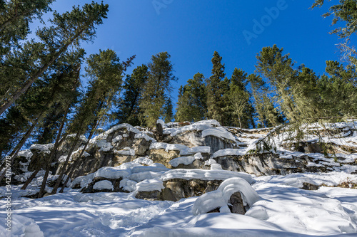Wonderful Winter Landscape with snow and green trees blue sky at Sunny Day.