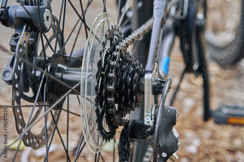 Close-up of a bicycle chain close-up with selective focus and blur