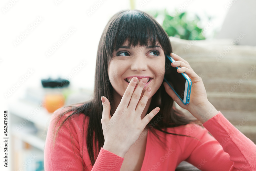 Woman chatting on the phone Woman chatting on the phone