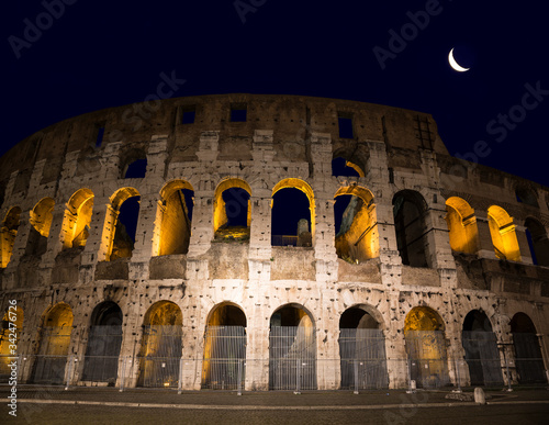 Ruins of the ancient Colosseum on a moonlit night  Rome  Italy